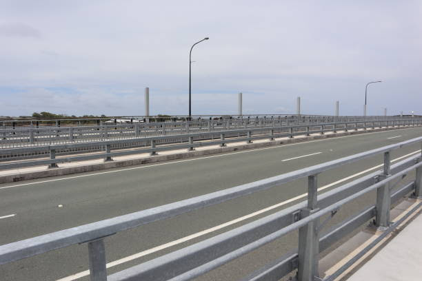 Steel guardrail barrier on a modern bridge.